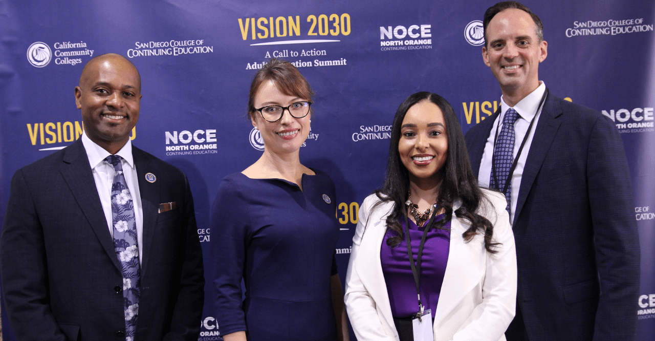 Chancellor Clift Breland with NOCE President Valentina Purtell with two others at Vision 2030 summit