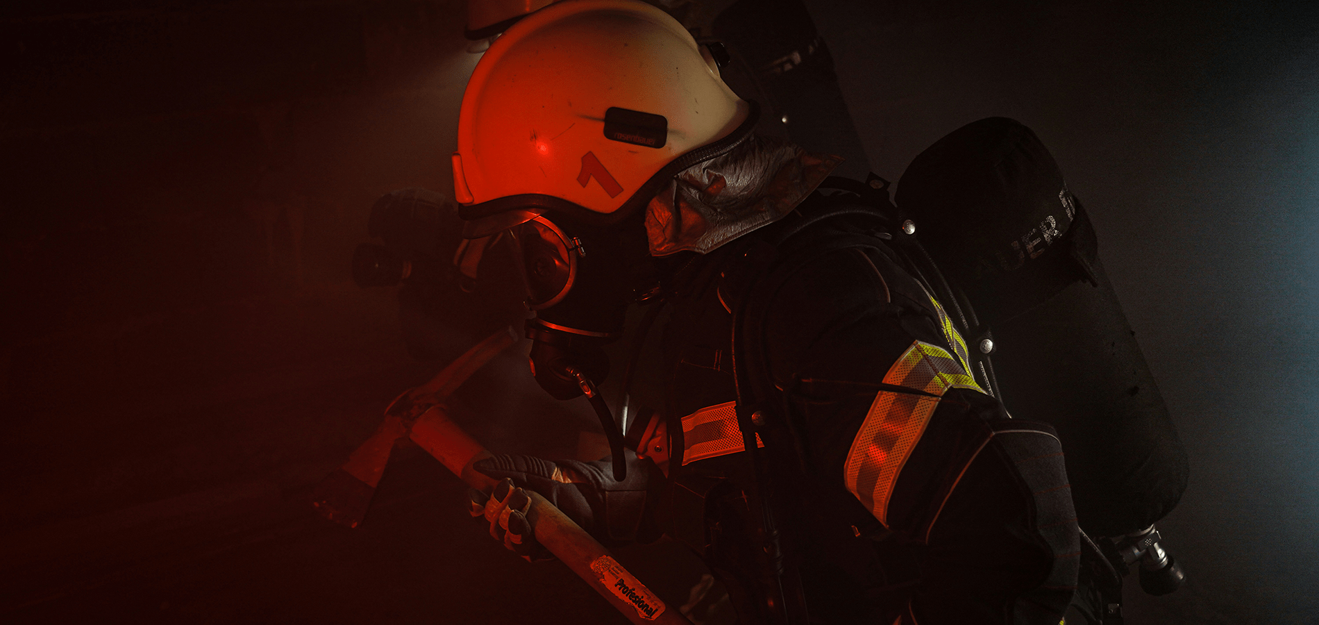 a firefighter holding an ax