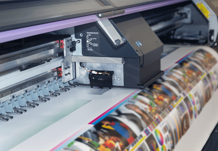 a print job exiting a large blotter