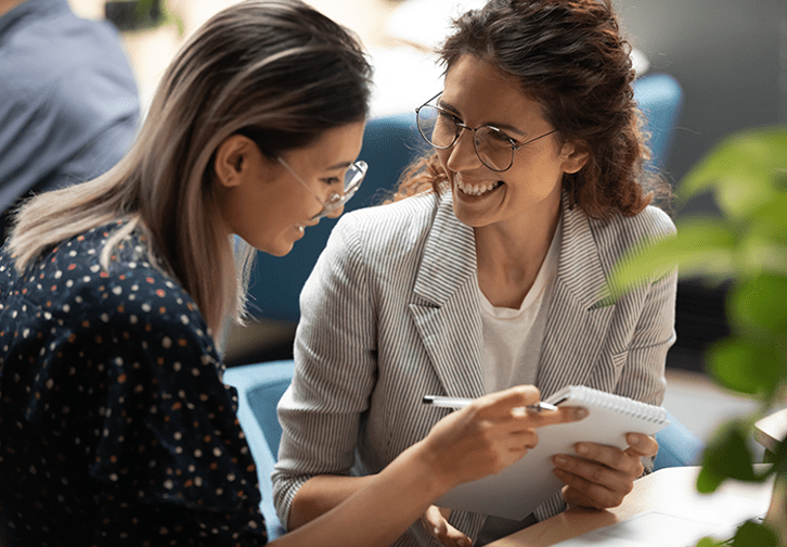 two women talking to each other