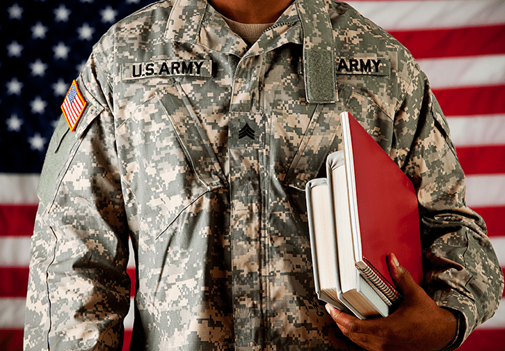 US soldier holding books