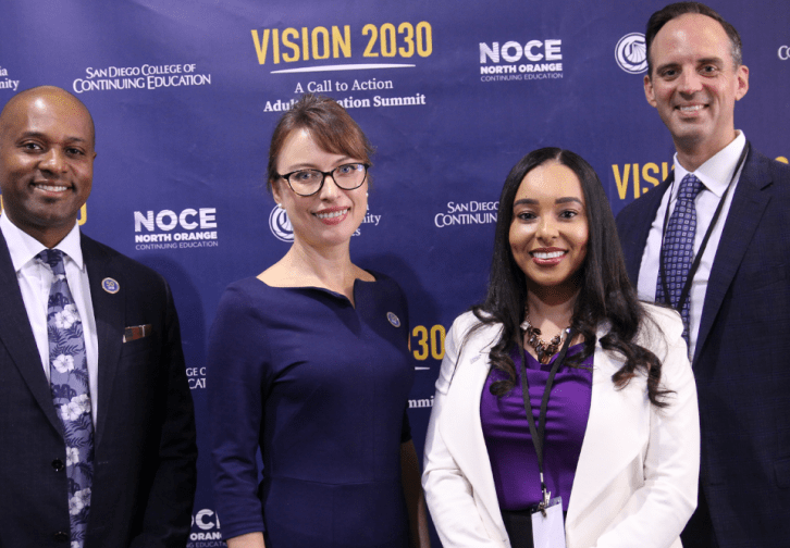 Chancellor Clift Breland with NOCE President Valentina Purtell with two others at Vision 2030 summit