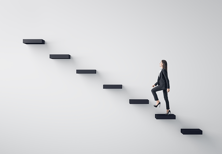 woman walking up steps