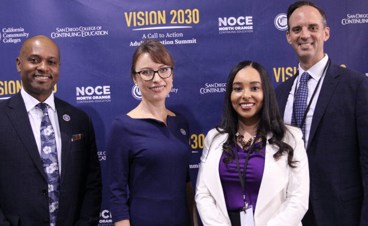 Chancellor Clift Breland with NOCE President Valentina Purtell with two others at Vision 2030 summit