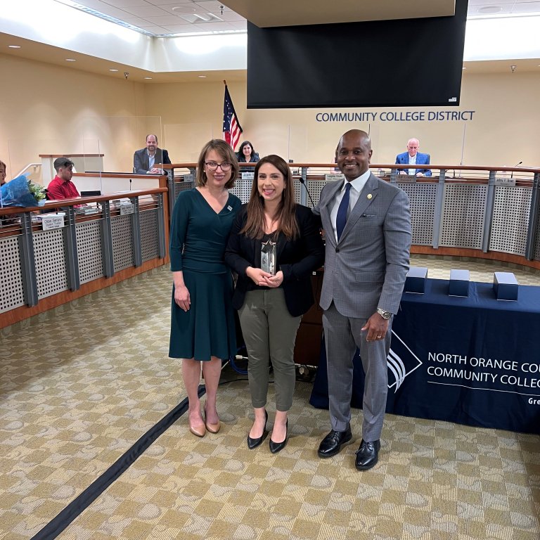 2022-23 North Star Award Recipient Dulce Delgadillo with the NOCE President and NOCCCD Chancellor in the Anaheim Campus Board Room