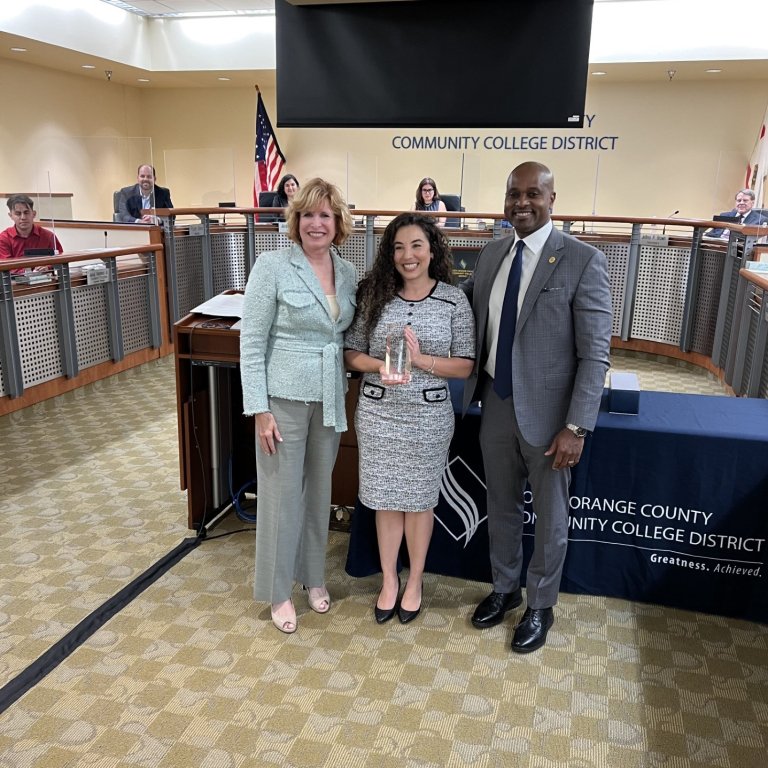 2022-23 North Star Award Recipient Ashley Berry with the Cypress College President and NOCCCD Chancellor in the Anaheim Campus Board Room