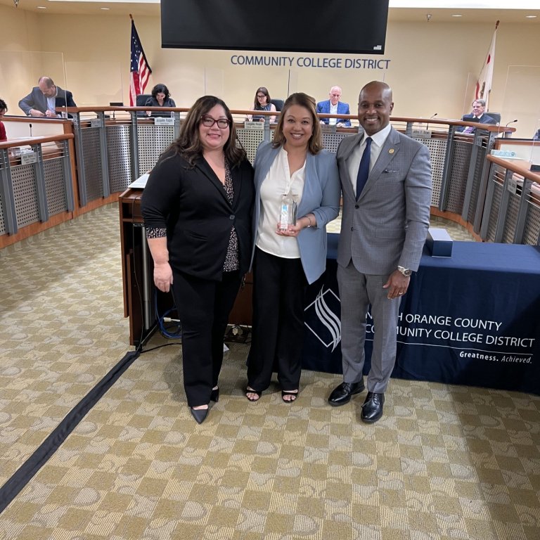 2022-23 North Star Award Recipient Dr. Naomi Querubin Abesamis with the Fullerton College President and NOCCCD Chancellor in the Anaheim Campus Board Room