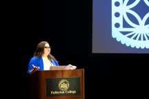 woman speaking at podium