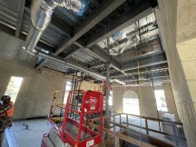 interior of a building under construction, showing HVAC ducts