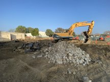 Rock and dirt being dug out with a bulldozer